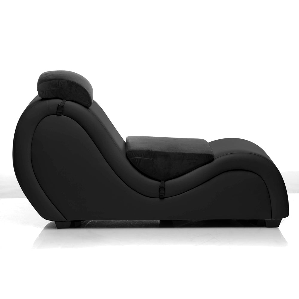 Black PU leather chaise lounge with straps and headrest.