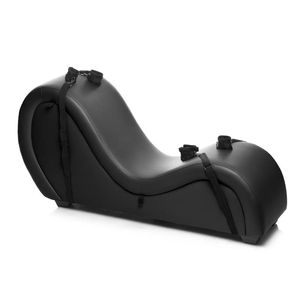 Black PU leather chaise lounge with straps and cuffs.