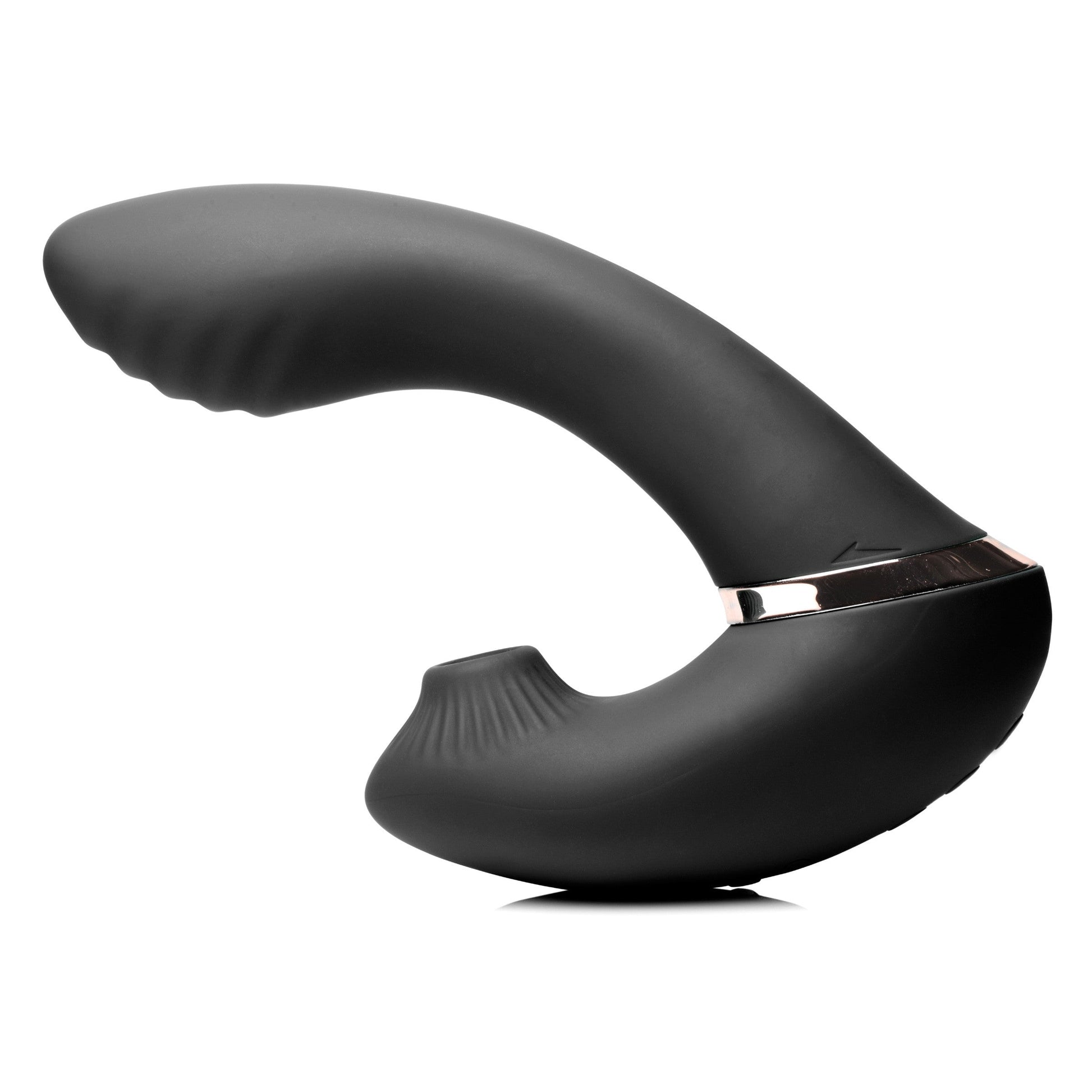 Black silicone vibrator with a rose gold band and textured tip.