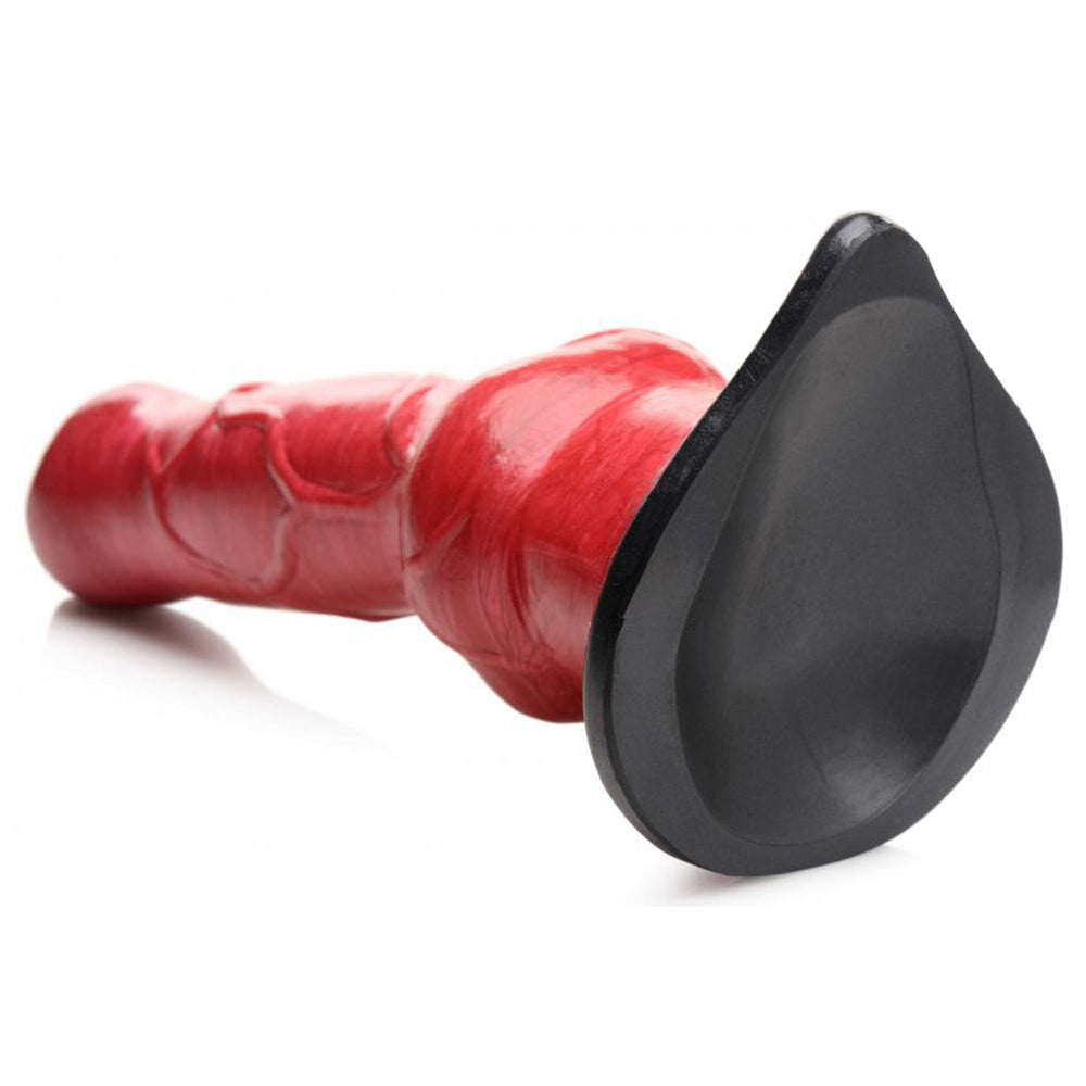 Red silicone dildo with a black suction cup base.