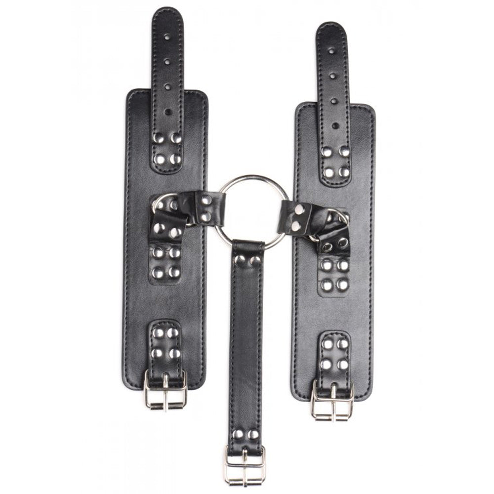 Black vegan leather neck to wrist restraints with metal O-ring and buckles.
