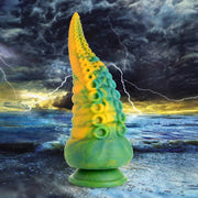 A green and yellow tentacle dildo with a suction cup base.