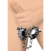 Stainless steel spiked testicle cages with a lock and chain.