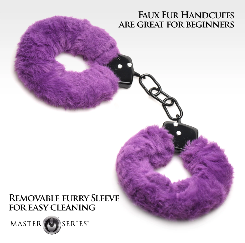 Purple furry handcuffs with a metal core and chain.