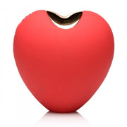 Red heart-shaped clitoral suction toy with a gold opening.
