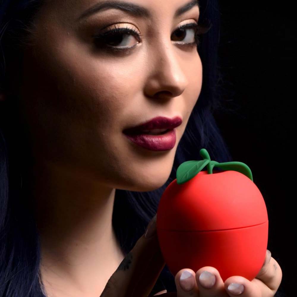 Red apple-shaped clitoral stimulator with green leaf detail.