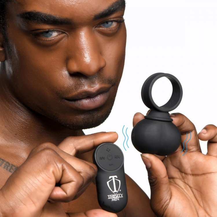 Black vibrating balls with a remote control and a silicone cock ring.