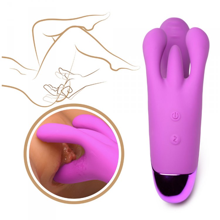 Purple triple rabbit vibrator with G-spot shaft and clitoral stimulators.