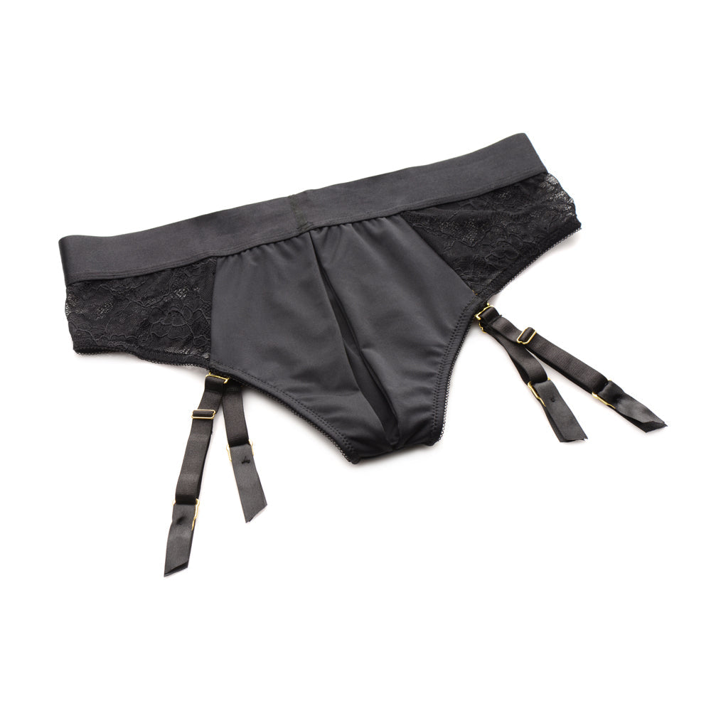 Black lace crotchless harness panties with adjustable garter straps.