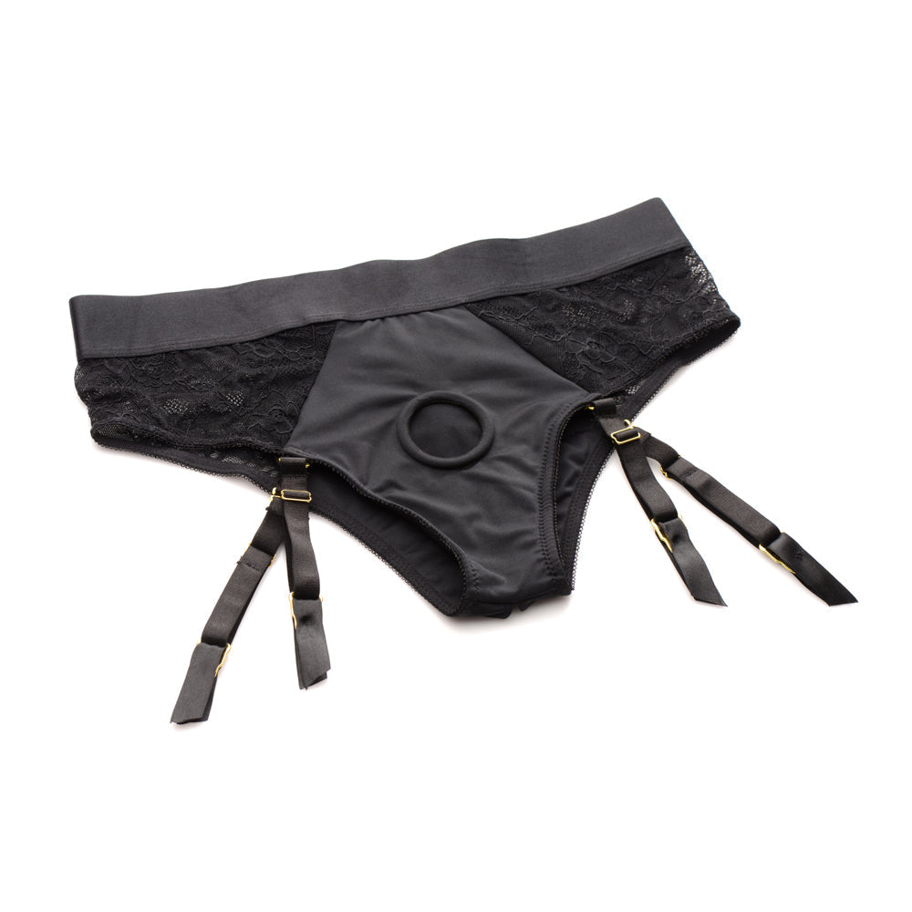 Black lace and satin crotchless harness panties with adjustable garters.