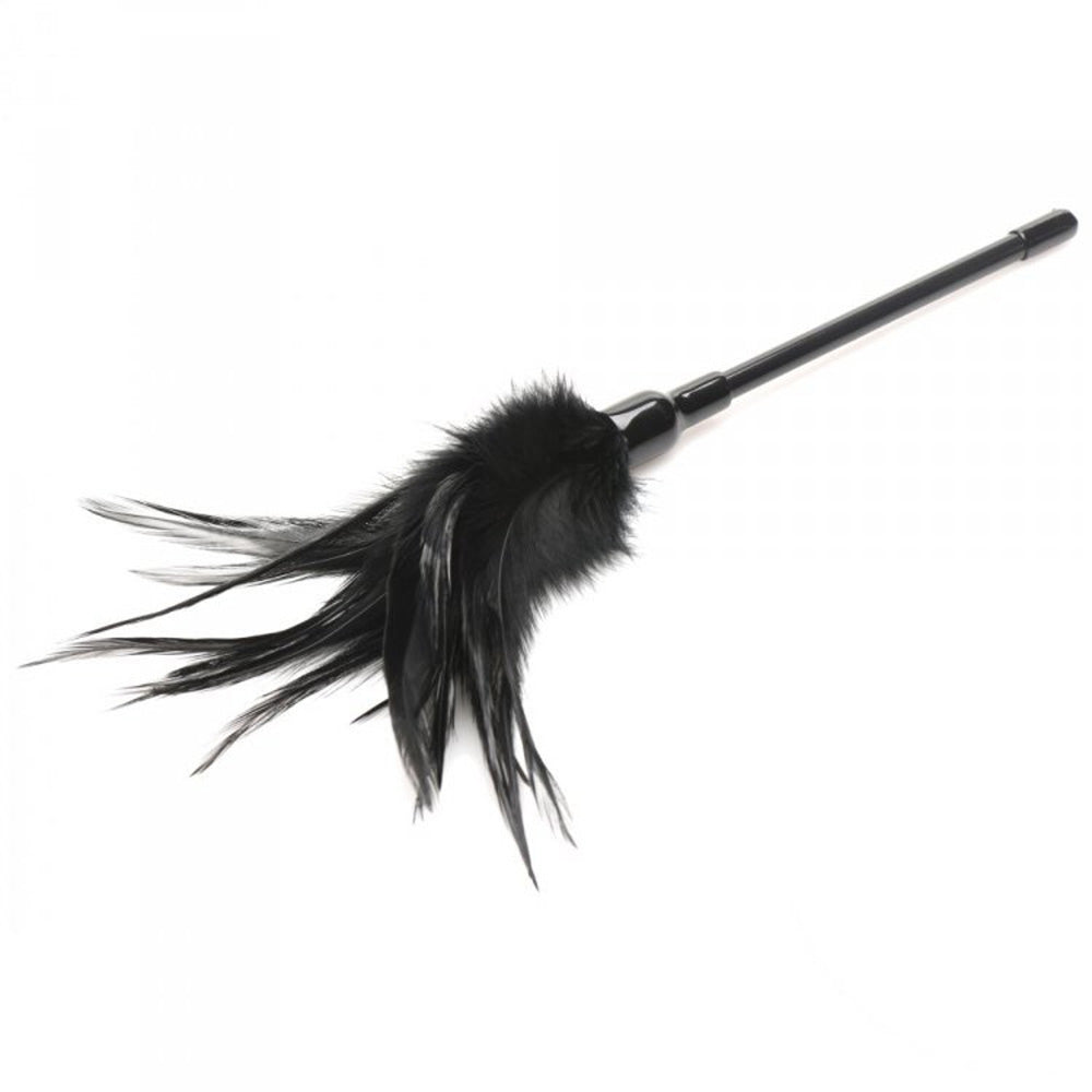 Black feather tickler with a black handle.