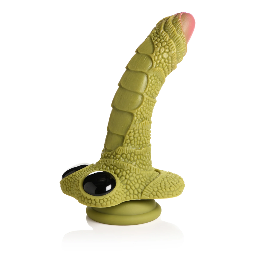 Green scaly dildo with black eyes and a pink tip.