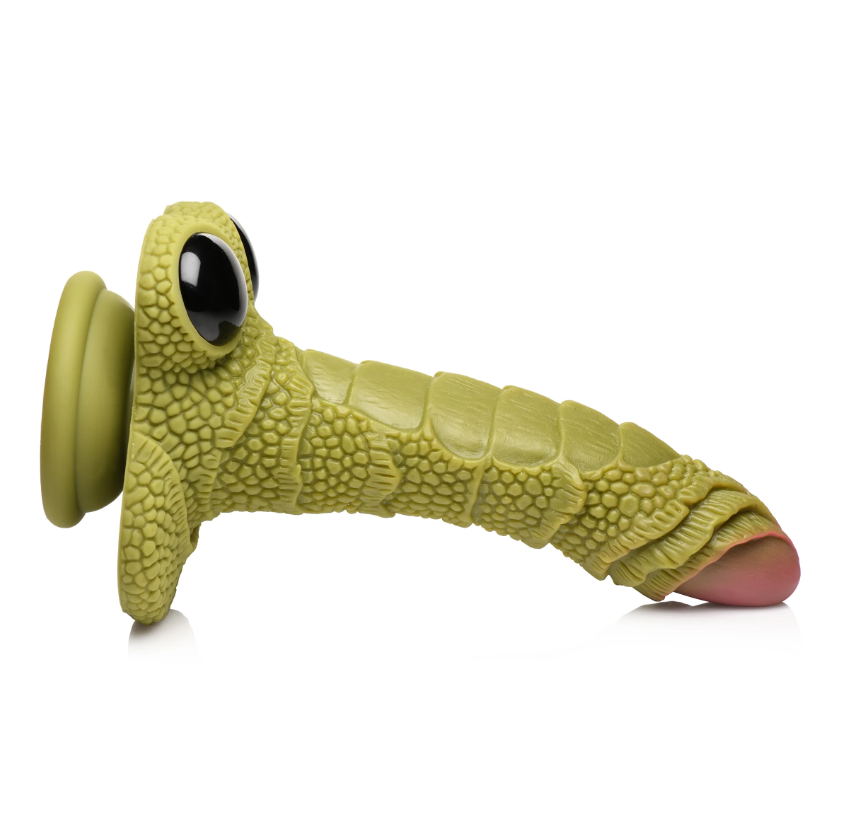 Green scaly dildo with black eyes and a pink tip.