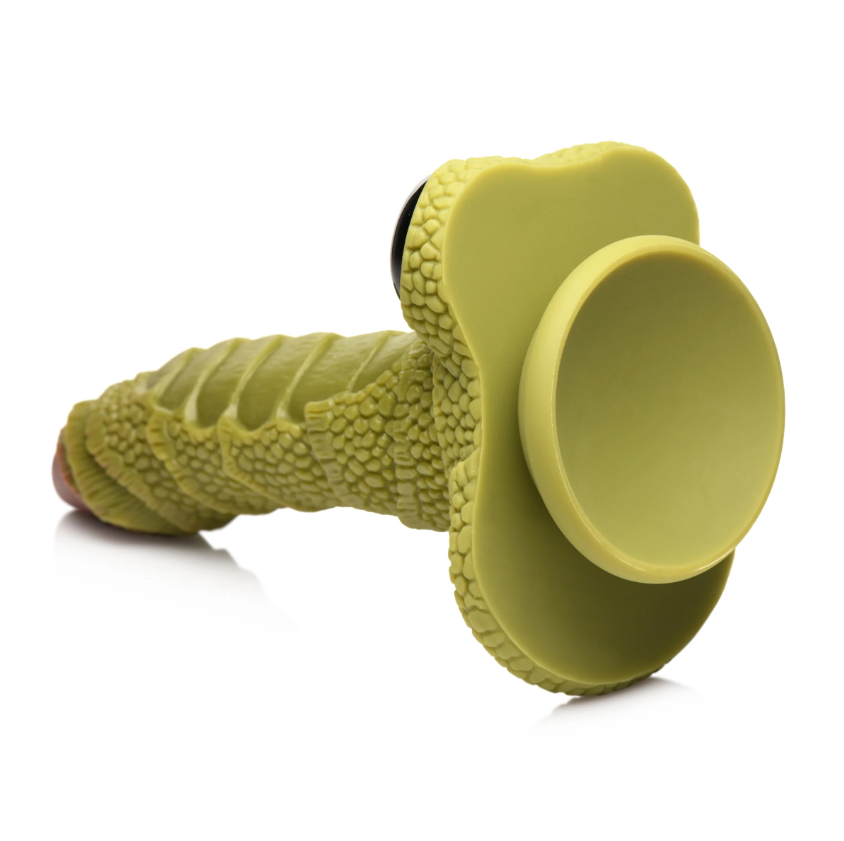 Green scaly fantasy dildo with a suction cup base.