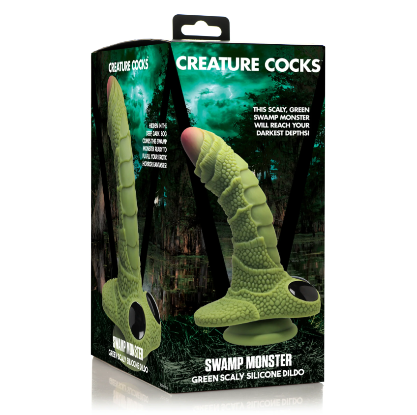 Green scaly silicone dildo with a suction cup base.