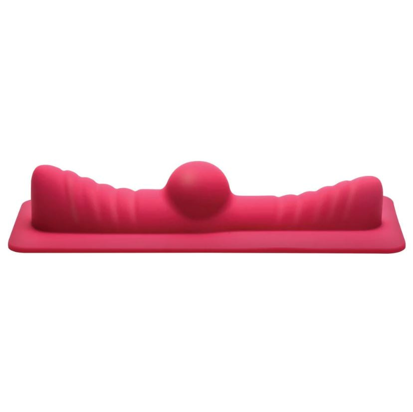 A pink saddle-shaped sex machine with a raised ball in the center.