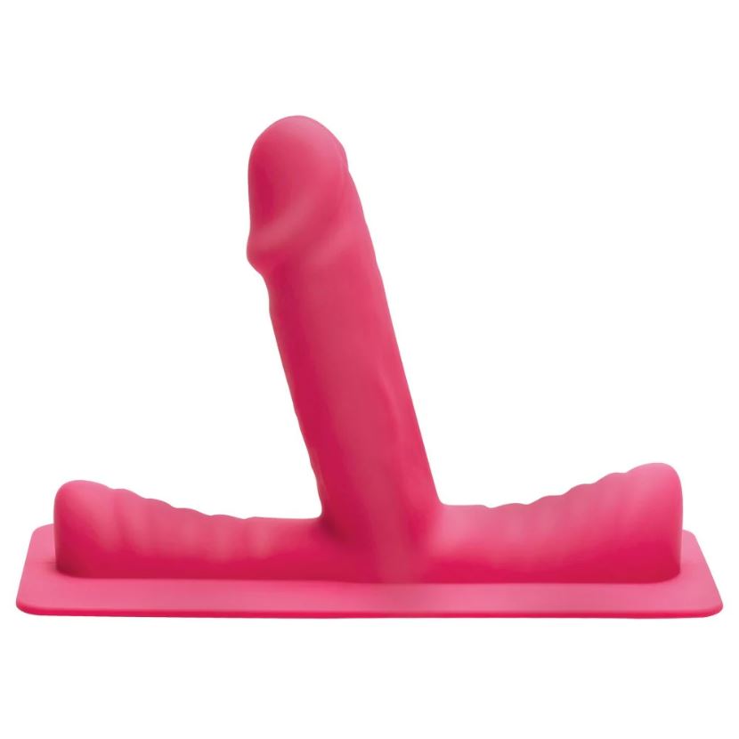 A pink sex machine with a saddle and a dildo attachment.