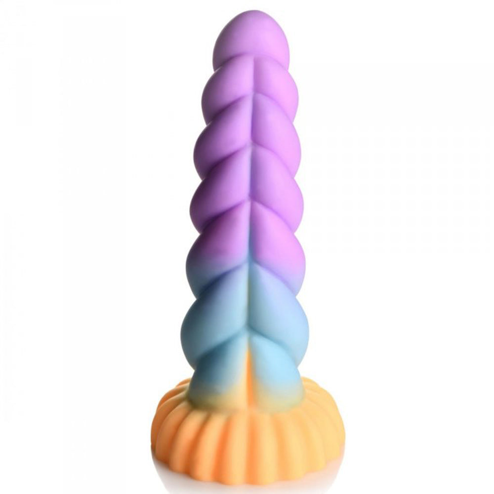 A rainbow-colored unicorn horn dildo with a textured surface and a fluted base.