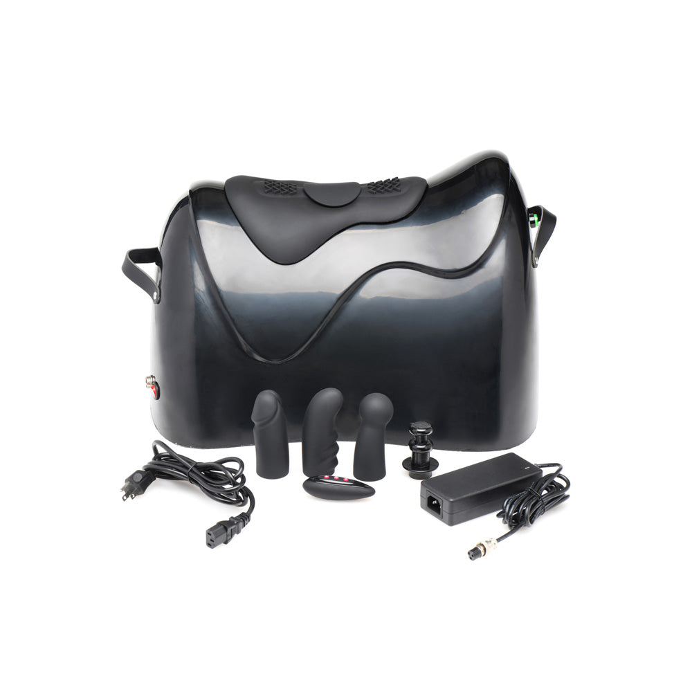 Black sex machine with attachments, power adapter, and remote.