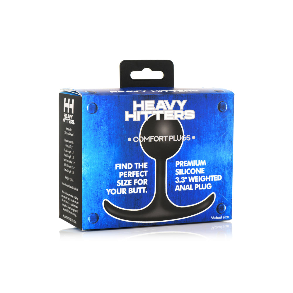 Black weighted silicone anal plug with metal core on its box.