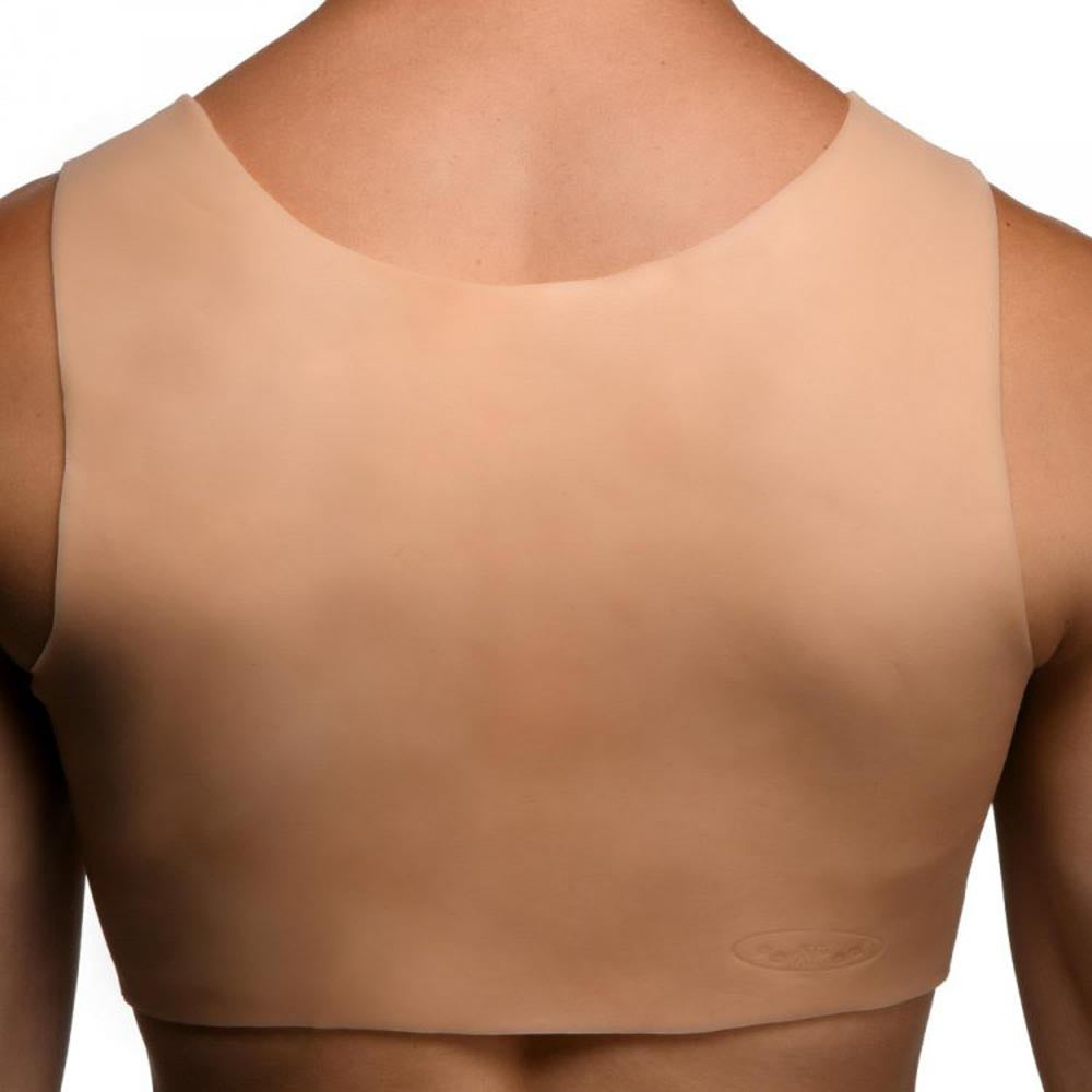 D-cup silicone breast forms with a beige harness.