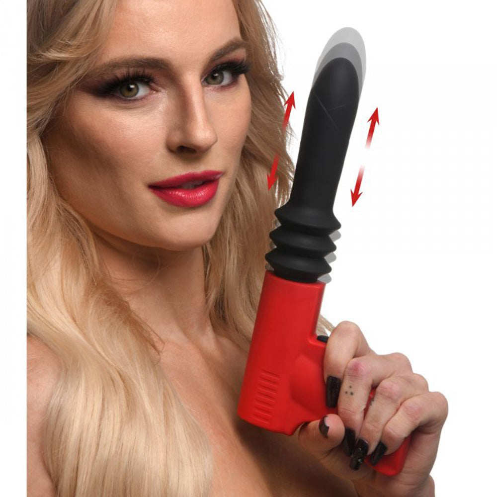 Red and black silicone thrusting vibrator with a pistol grip.