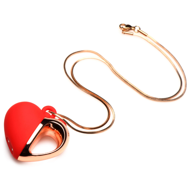 Red and rose gold heart necklace with a snake chain.