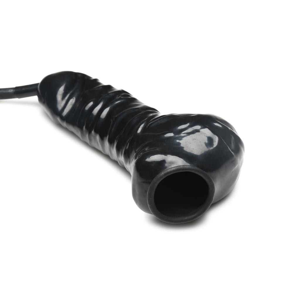 Black latex penis sheath with a textured surface and a silicone hose.