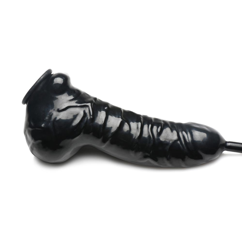 Black realistic latex penis sheath with a textured surface and a silicone hose.