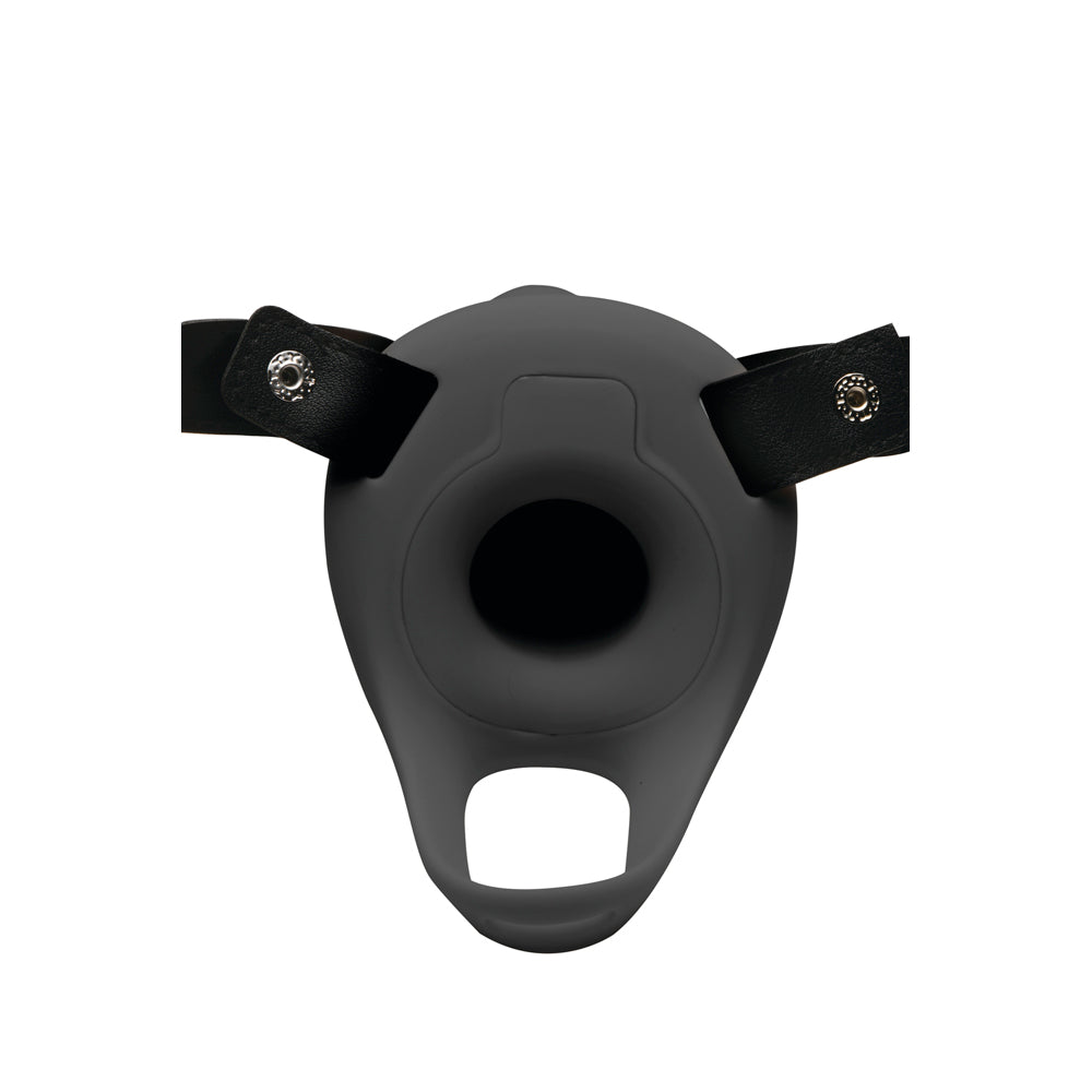 A grey vibrating silicone penis sheath with black leather straps.