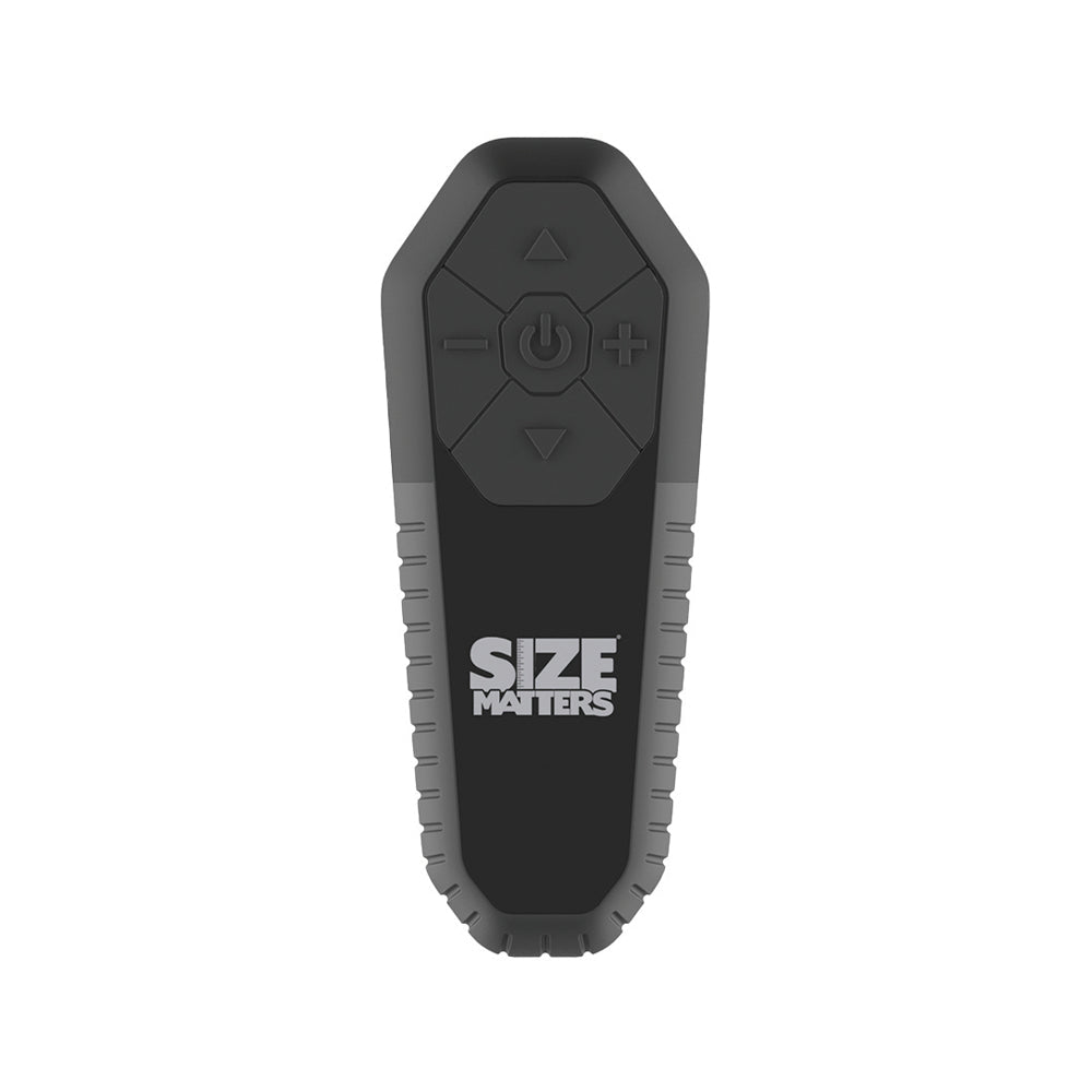 Black and gray remote control with power, volume, and directional buttons.