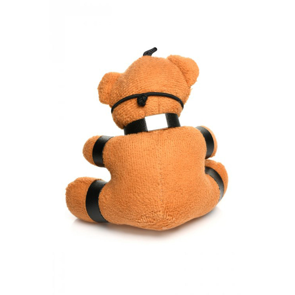 Burnt orange teddy bear keychain with black bondage accents.