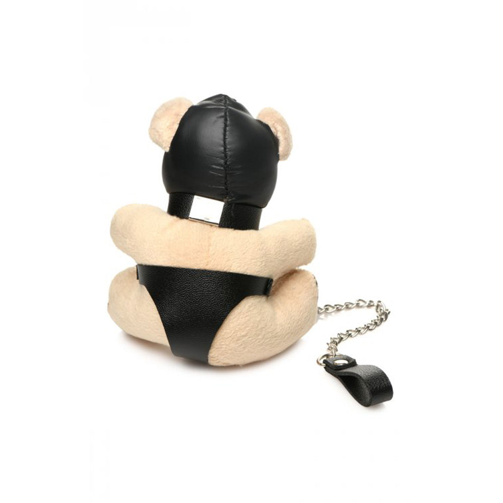 Teddy bear keychain with black leather hood and leash.