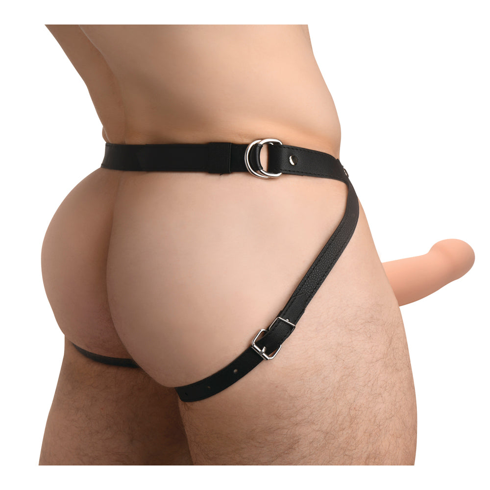 Silicone penis sheath with adjustable black leather harness.