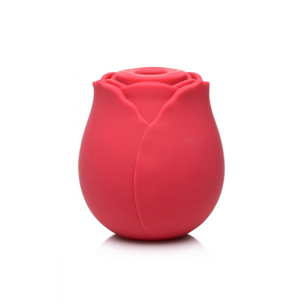 Red silicone rose toy with a textured opening.