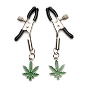 Nipple clamps with adjustable screws and green leaf charms.
