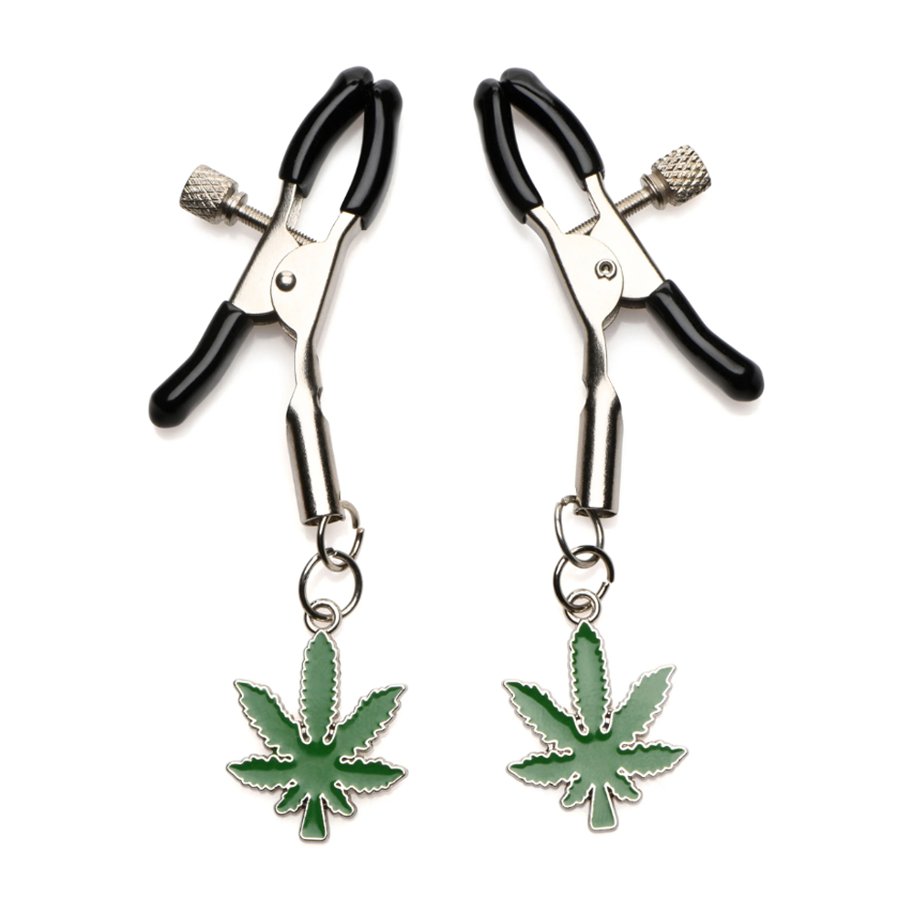 Nipple clamps with adjustable screws and green leaf charms.