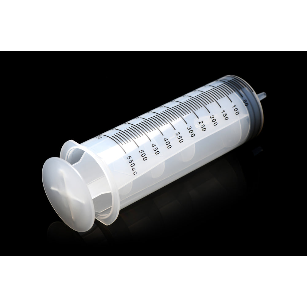 A clear 550ml syringe with measurement markings and a white plunger.