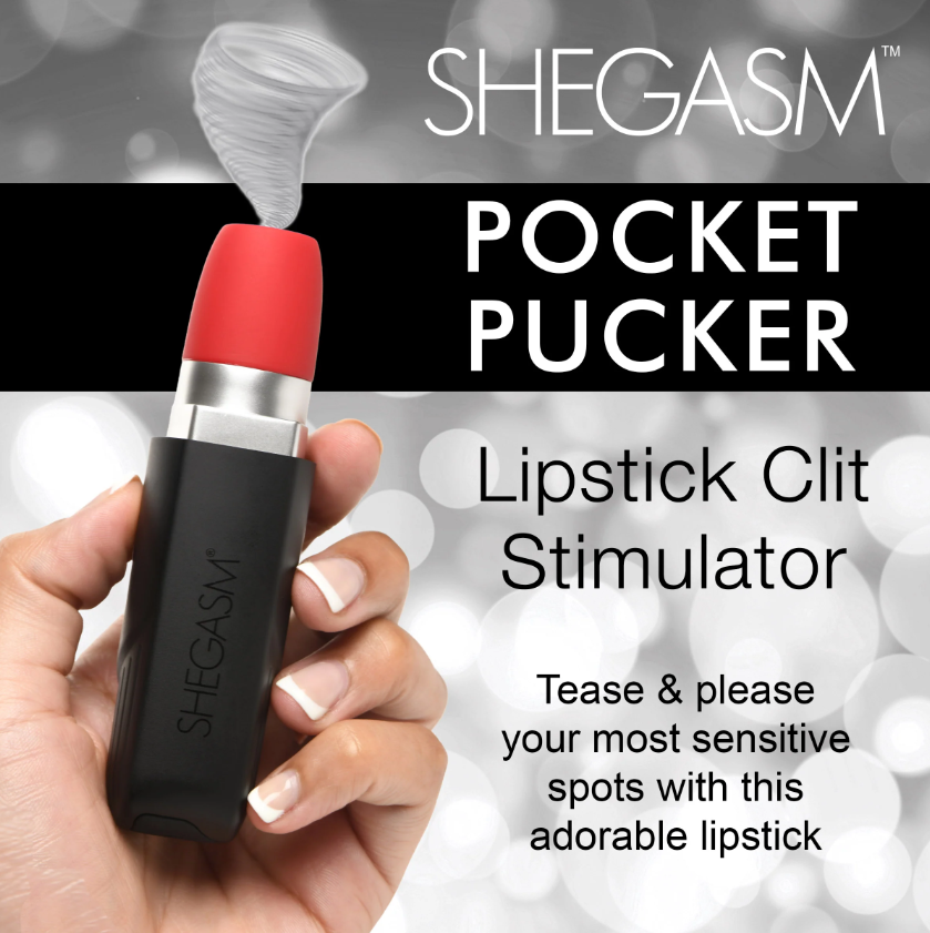 A black lipstick-shaped vibrator with a red tip held in a hand.