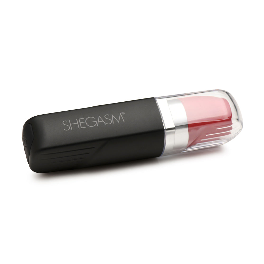 A black lipstick-shaped vibrator with a clear cap and red tip.