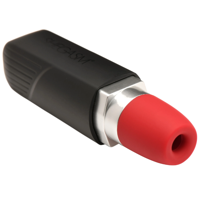 Black lipstick-shaped vibrator with a red silicone tip.