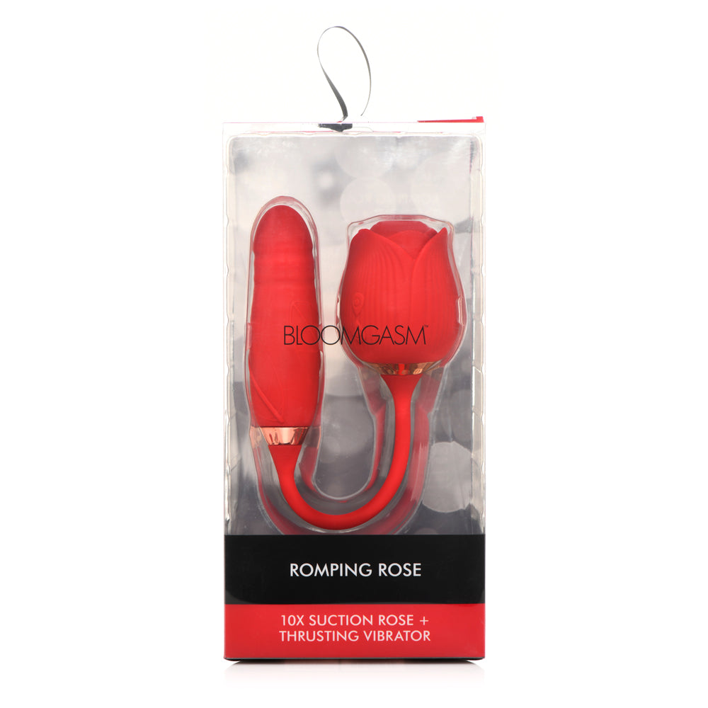 Red rose-shaped suction and thrusting vibrator in packaging.