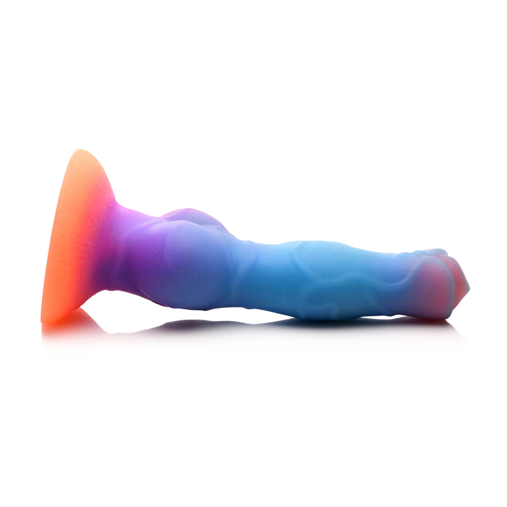 A glow-in-the-dark silicone dildo with a suction cup base.