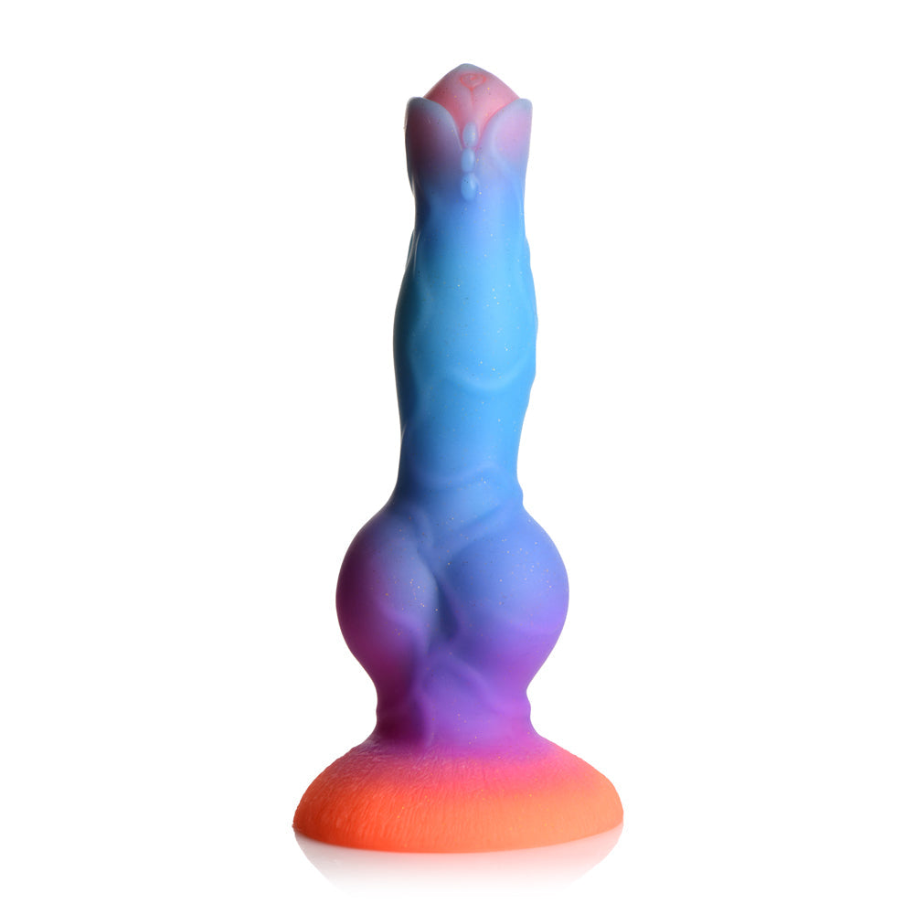 Glow-in-the-dark alien fantasy dildo in blue-purple silicone with suction cup base.