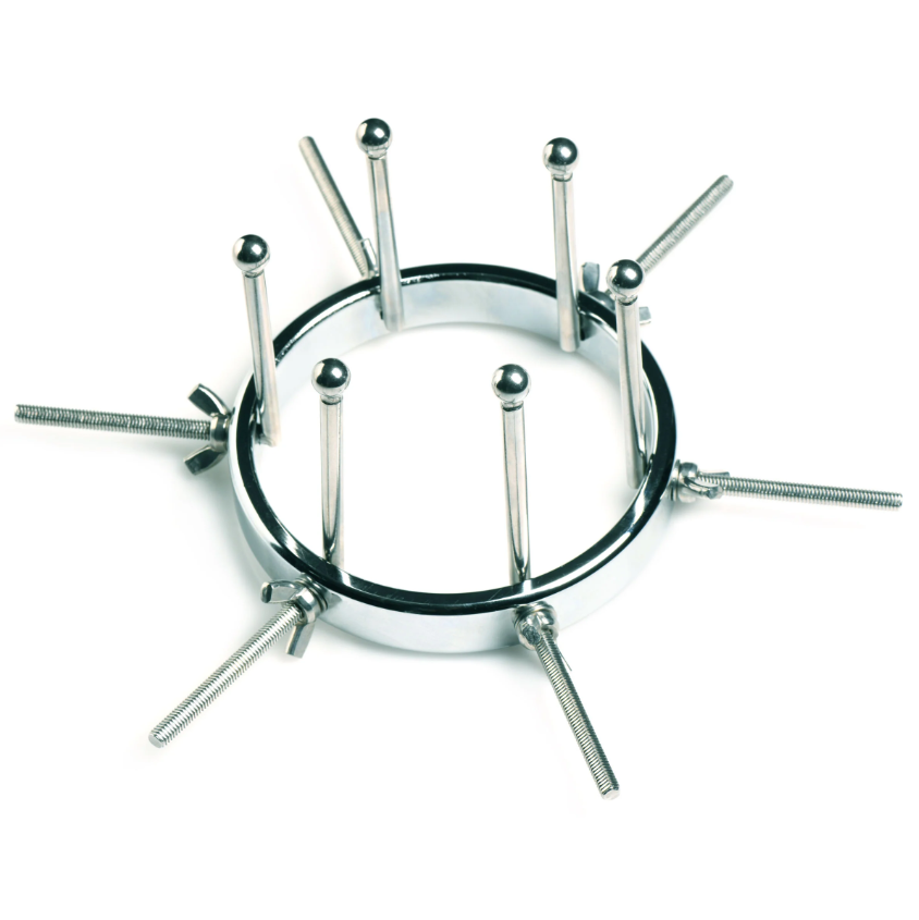 Stainless steel anal dilator with six adjustable prongs and ball ends.