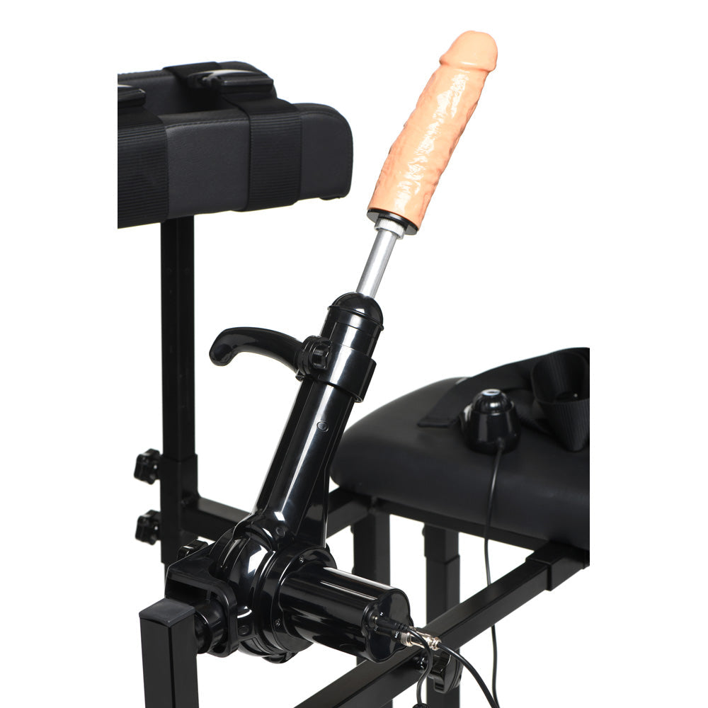 Adjustable bondage chair with a sex machine and dildo.