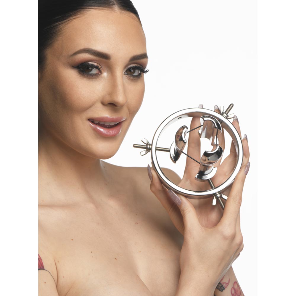 Stainless steel expanding anal plug expander with adjustable screws.