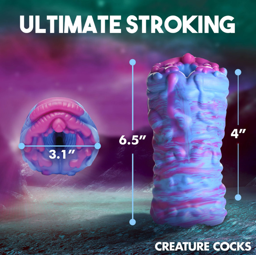 A blue and pink alien-themed silicone stroker with dimensions labeled.