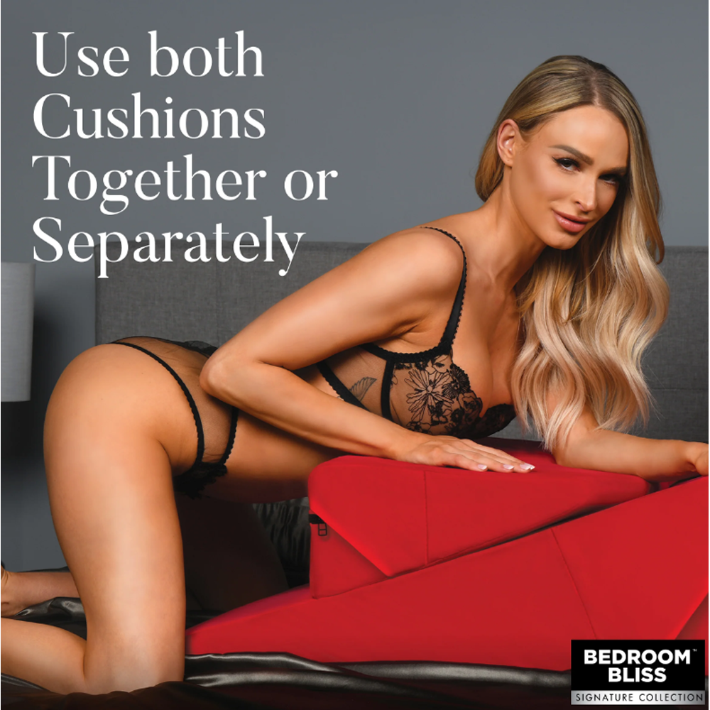 A woman poses with a red foam wedge pillow set.