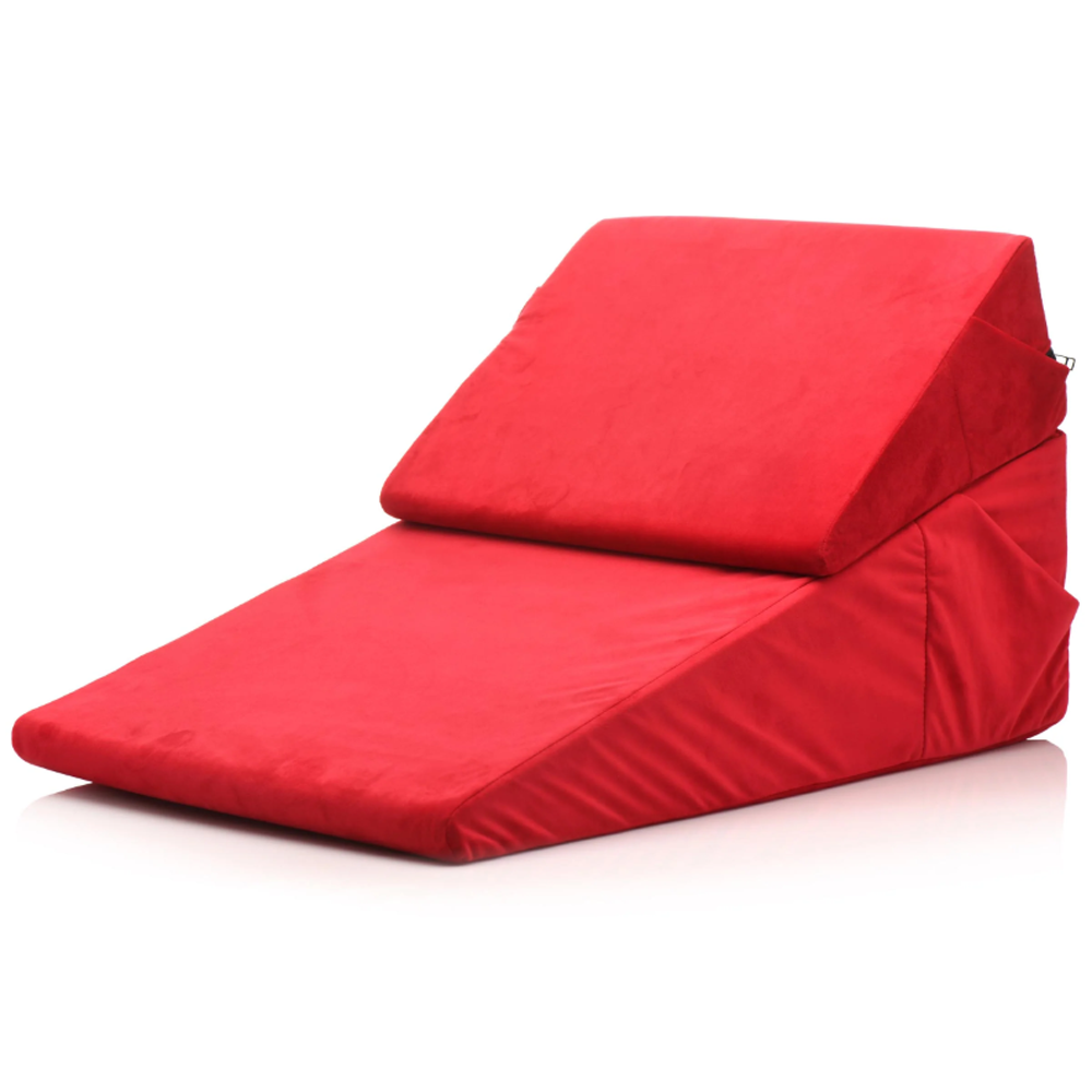 Red velvet foam wedge pillow set for support.
